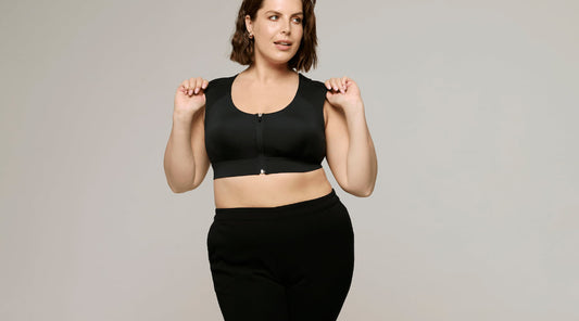 Woman with large bust wearing Etalon posture bra for added support.