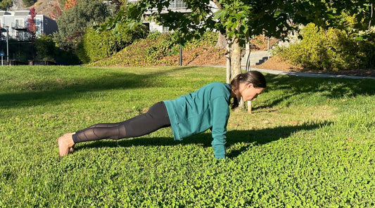 Woman performing posture-improving exercises to strengthen back and shoulders.
