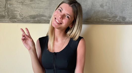 Woman wearing Etalon posture correcting bra.