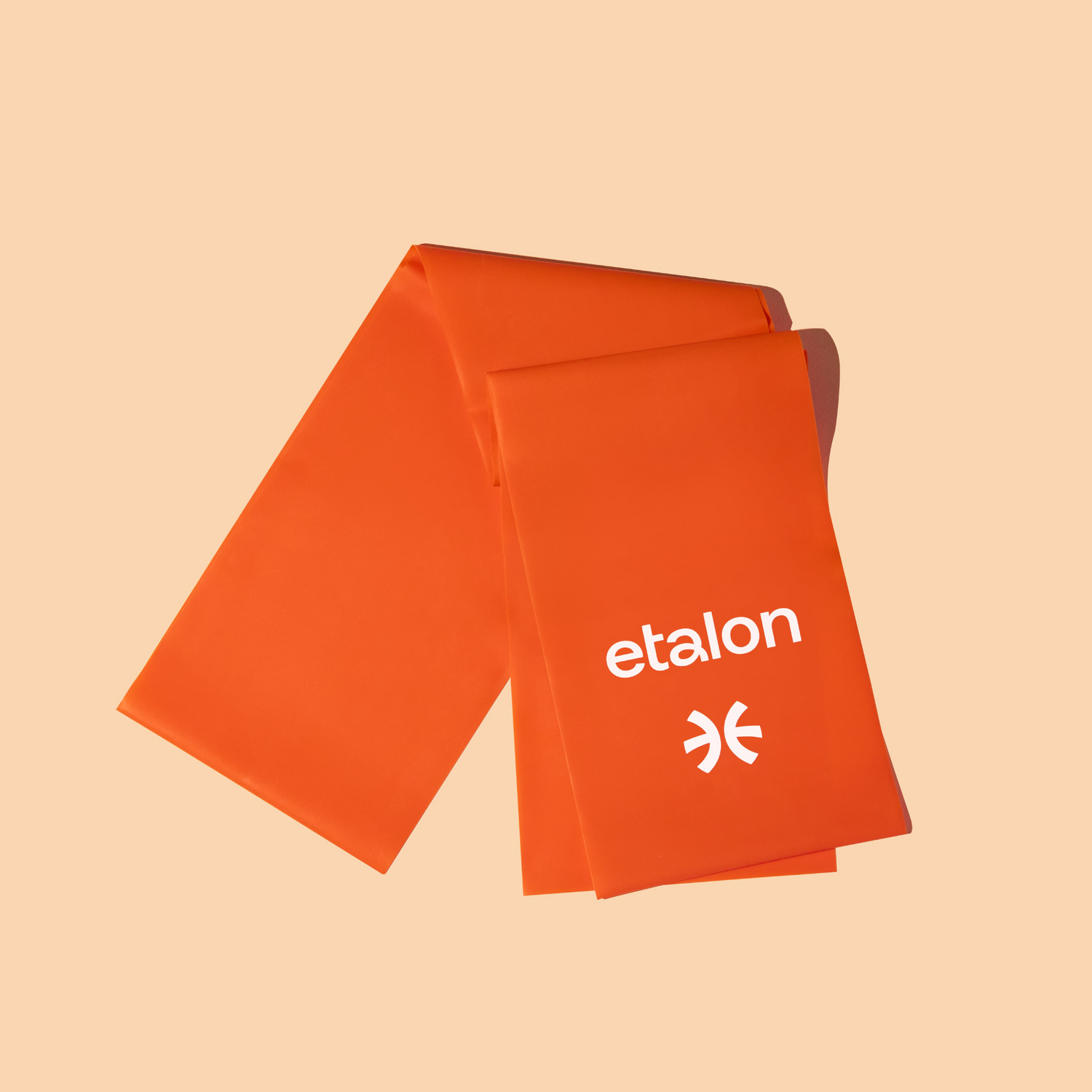 An orange Etalon elastic exercise band designed to improve posture and strengthen core and shoulder muscles.