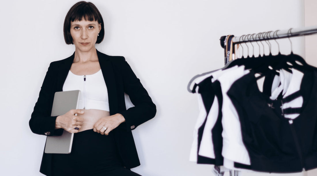 Etalon founder standing confidently, representing her journey from idea to successful posture bra.