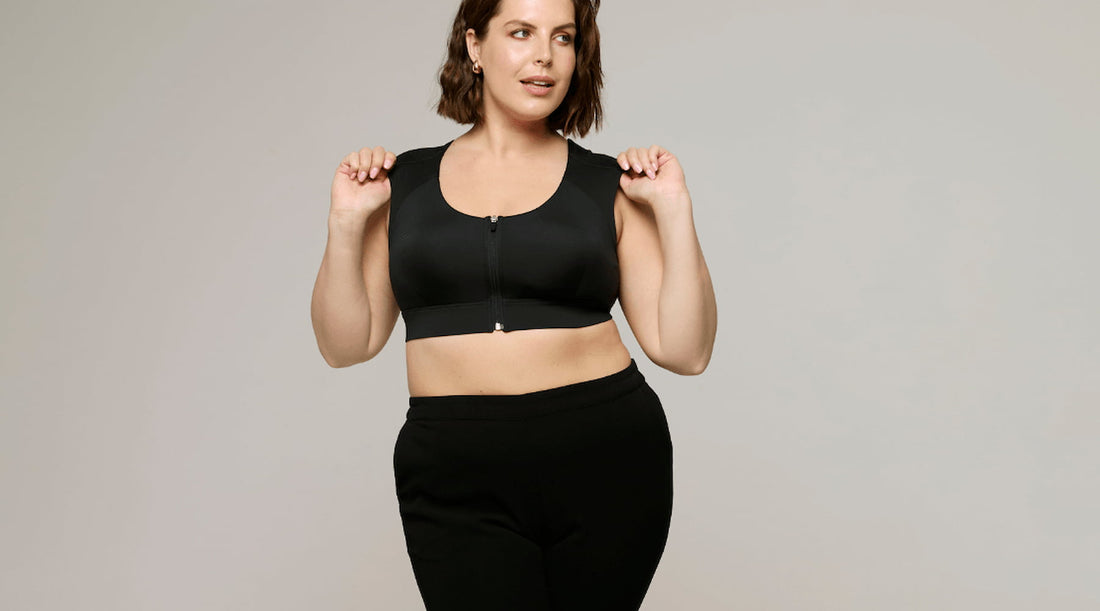 Woman with large bust wearing Etalon posture bra for added support.