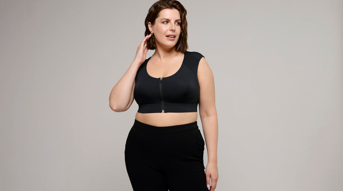 Confident woman with large bust wearing Etalon posture bra.