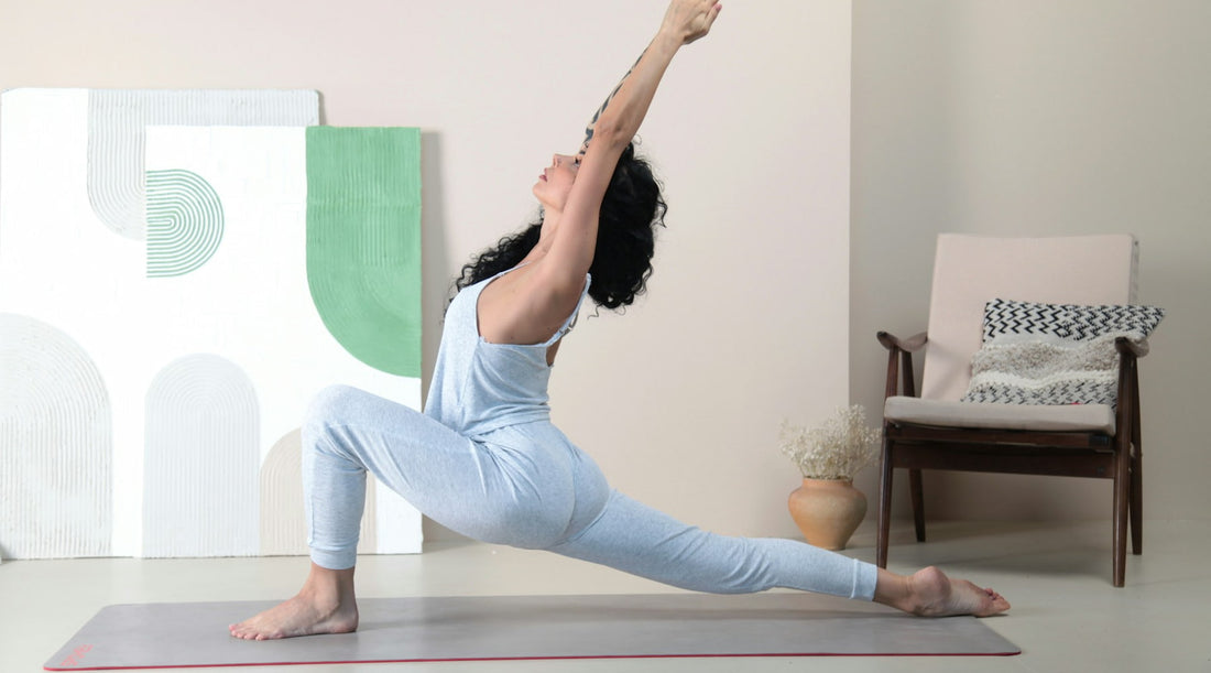 Woman doing yoga stretching demonstrates how proper posture supports overall mobility.