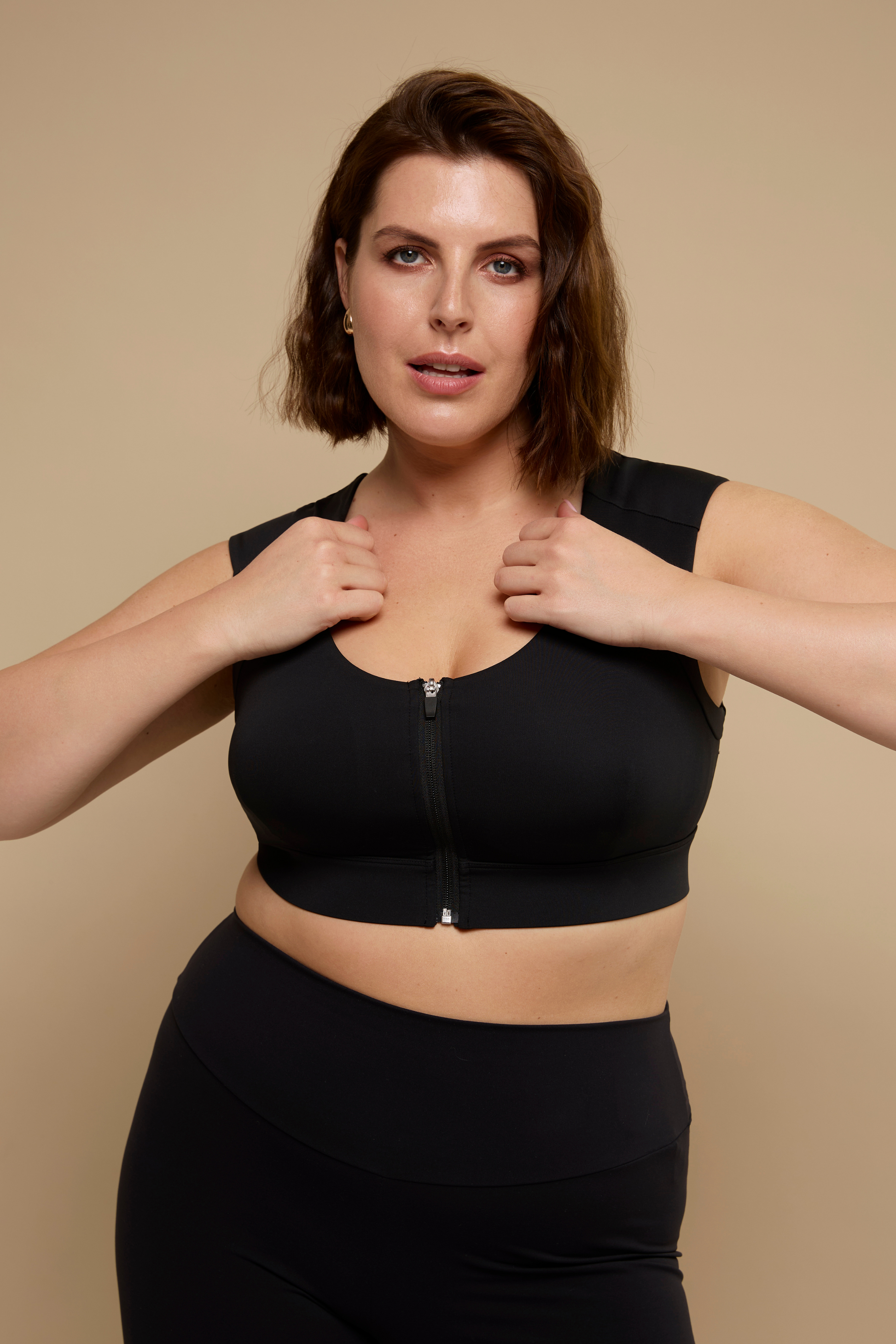 Black front closure posture bra designed for full bust women.