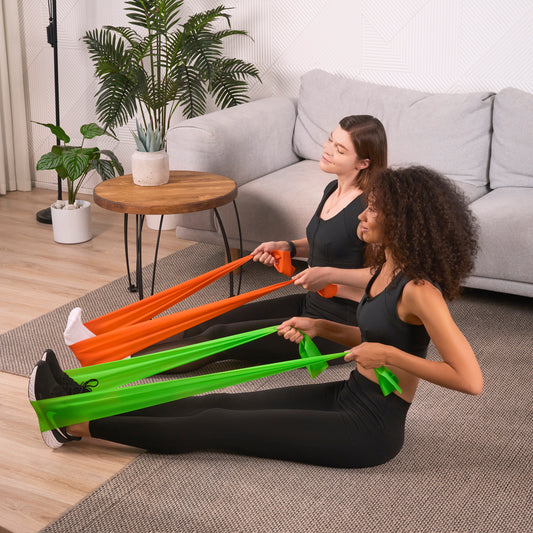 Etalon workout bands in green and orange for posture support.