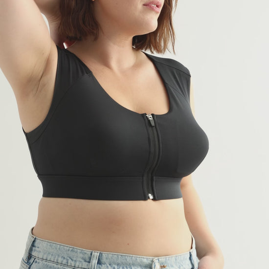 Black posture bra for improved spinal alignment.